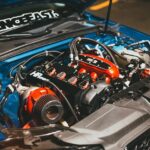 Detailed view of a customized car engine with performance modifications.