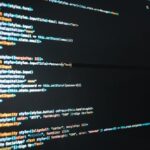 Detailed close-up view of programming code on a computer screen, showcasing a web application interface.